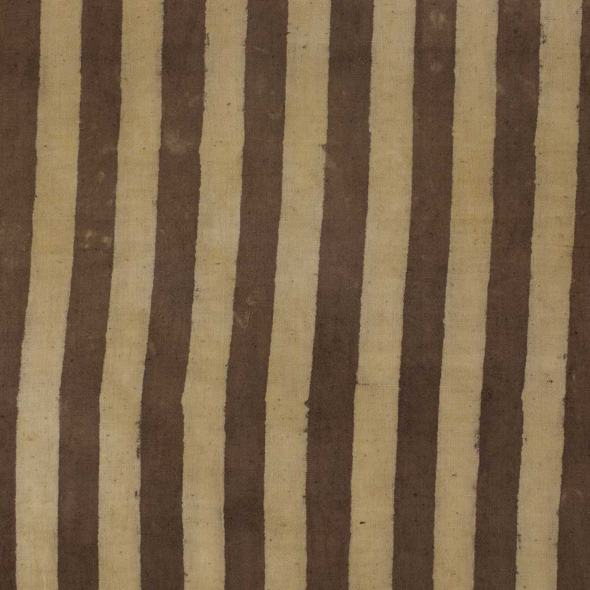 Bomullstyg på metervara i beige och brunt