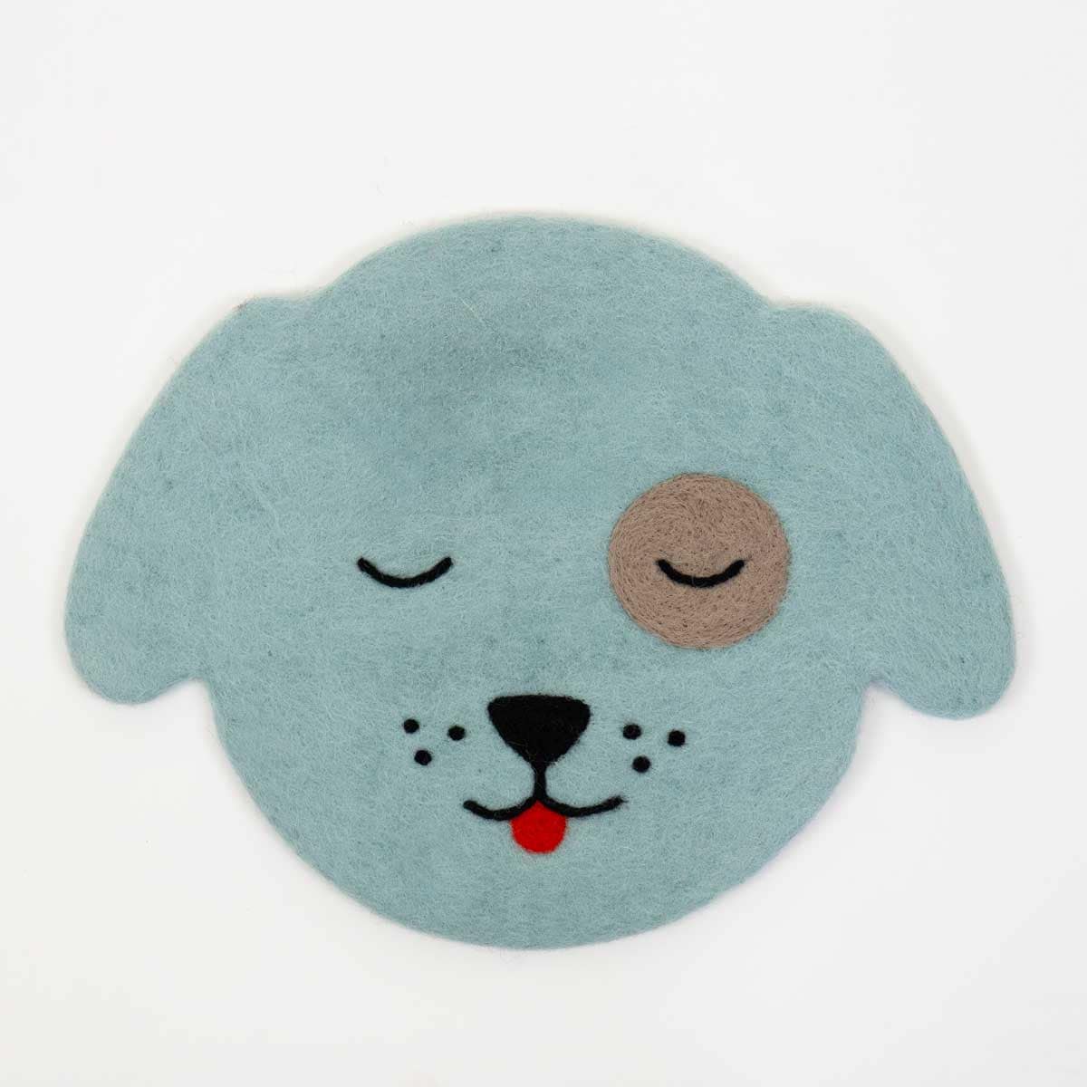 Turkos sittdyna i form av hund, handtovad ull