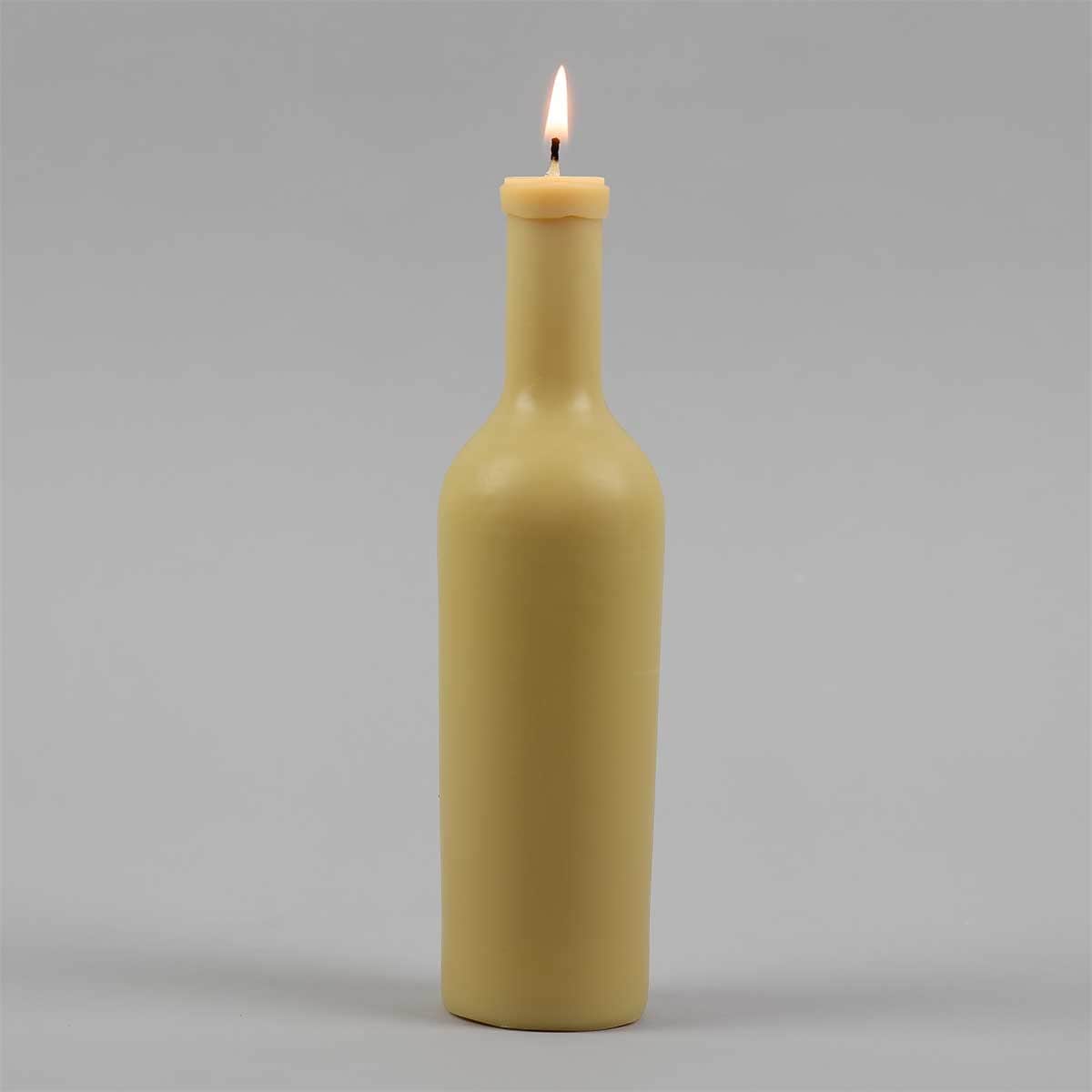 Ljus i form av en flaska